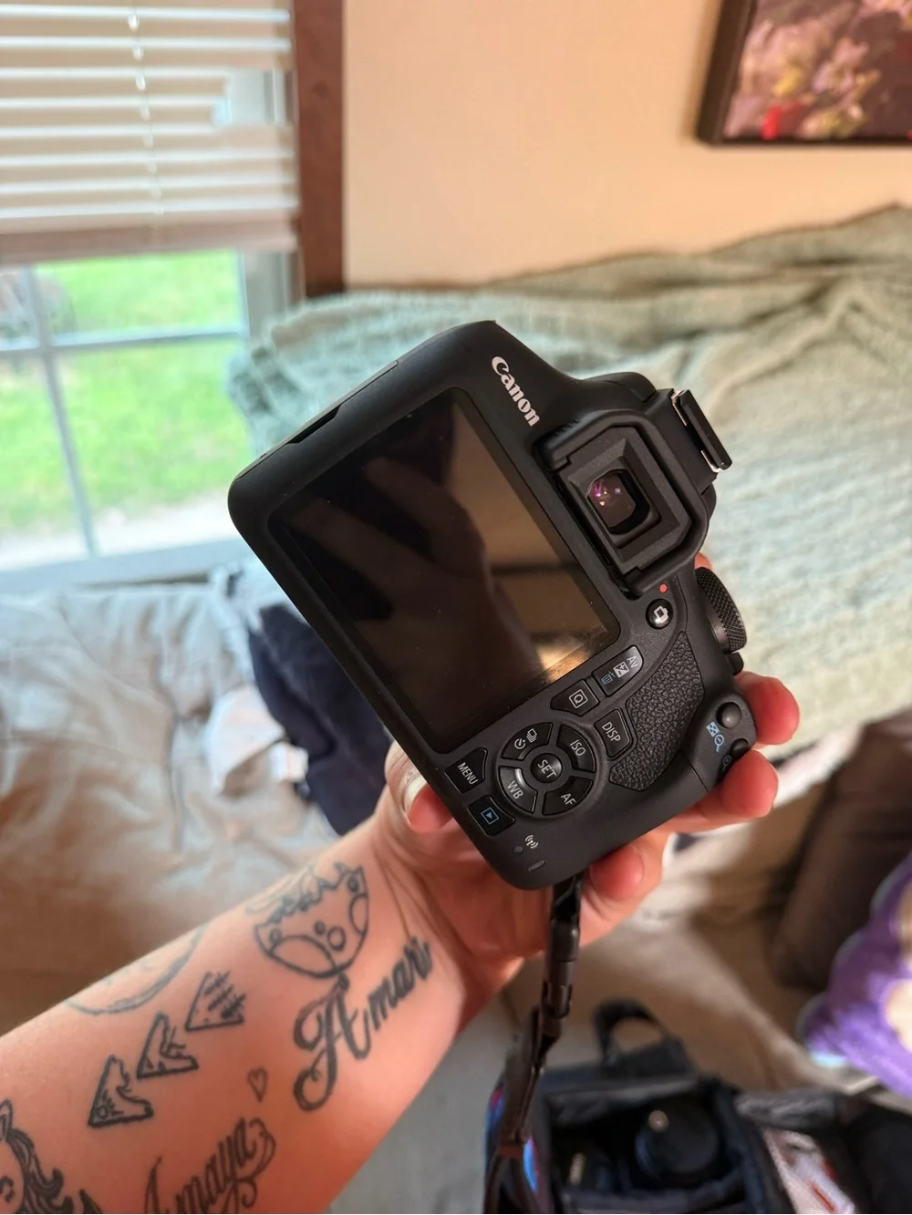 Canon DSLR Camera Kit with Black Body and Silver Lens Accents
